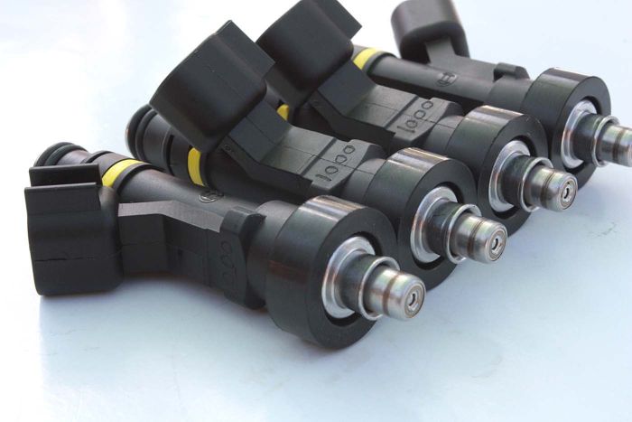 Fiveomotorsport 1000cc/min Honda fuel injectors custom fit for B, D, and H Series Honda or equivalent 4 cylinder engines. Electrical connectors included.